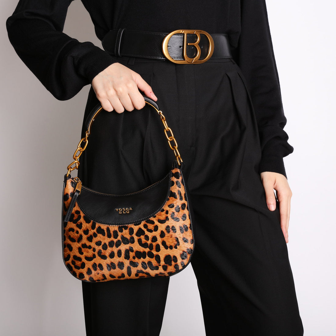 black madison shoulder bag with animal print