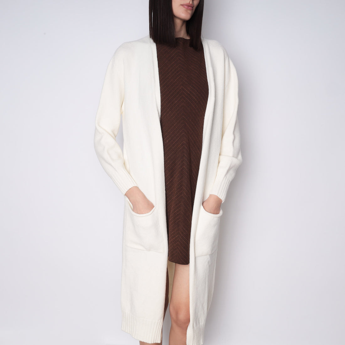 Natural Long knitted coat with pockets