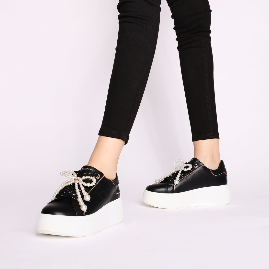 Clara leather sneakers with black pearl bow