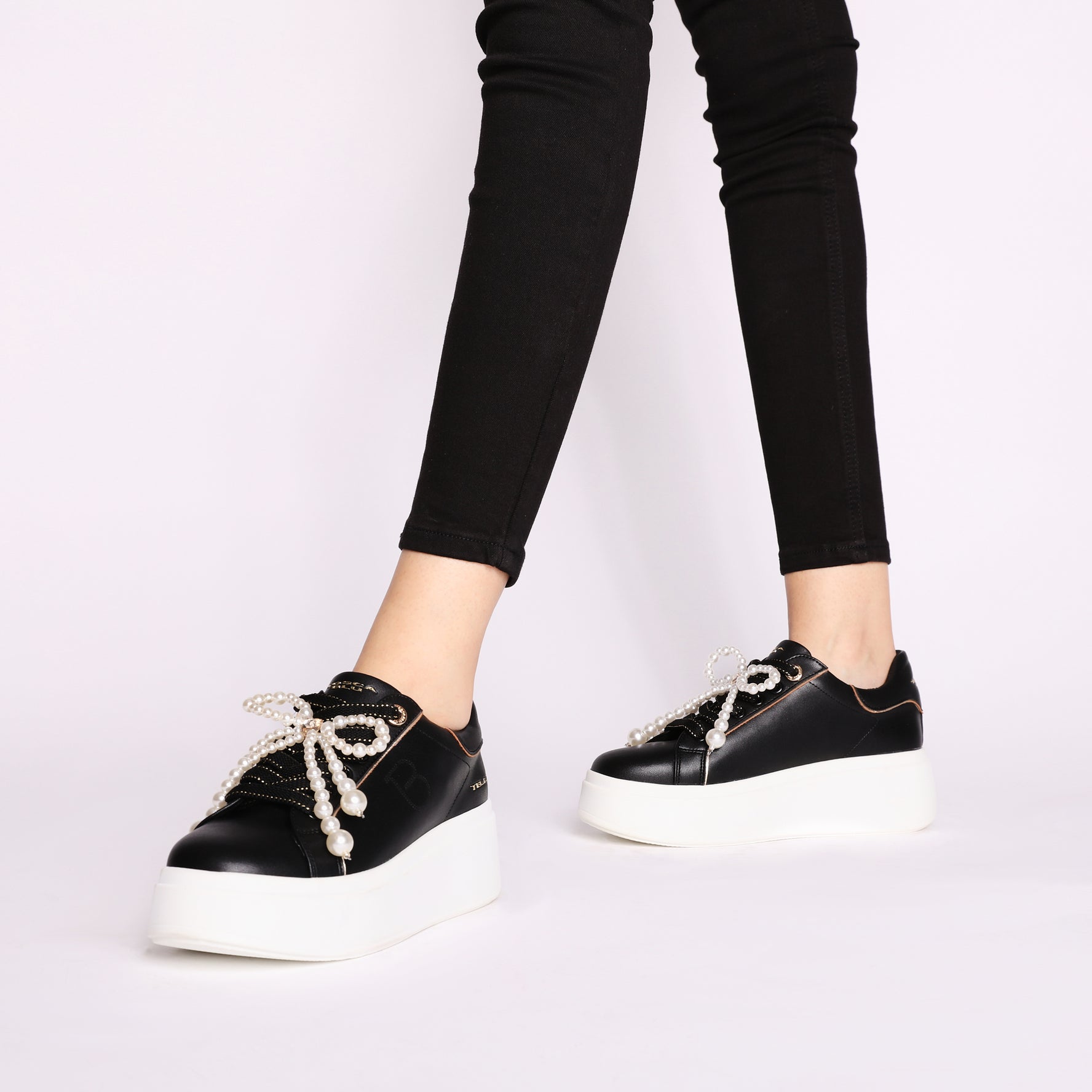 Clara leather sneakers with black pearl bow