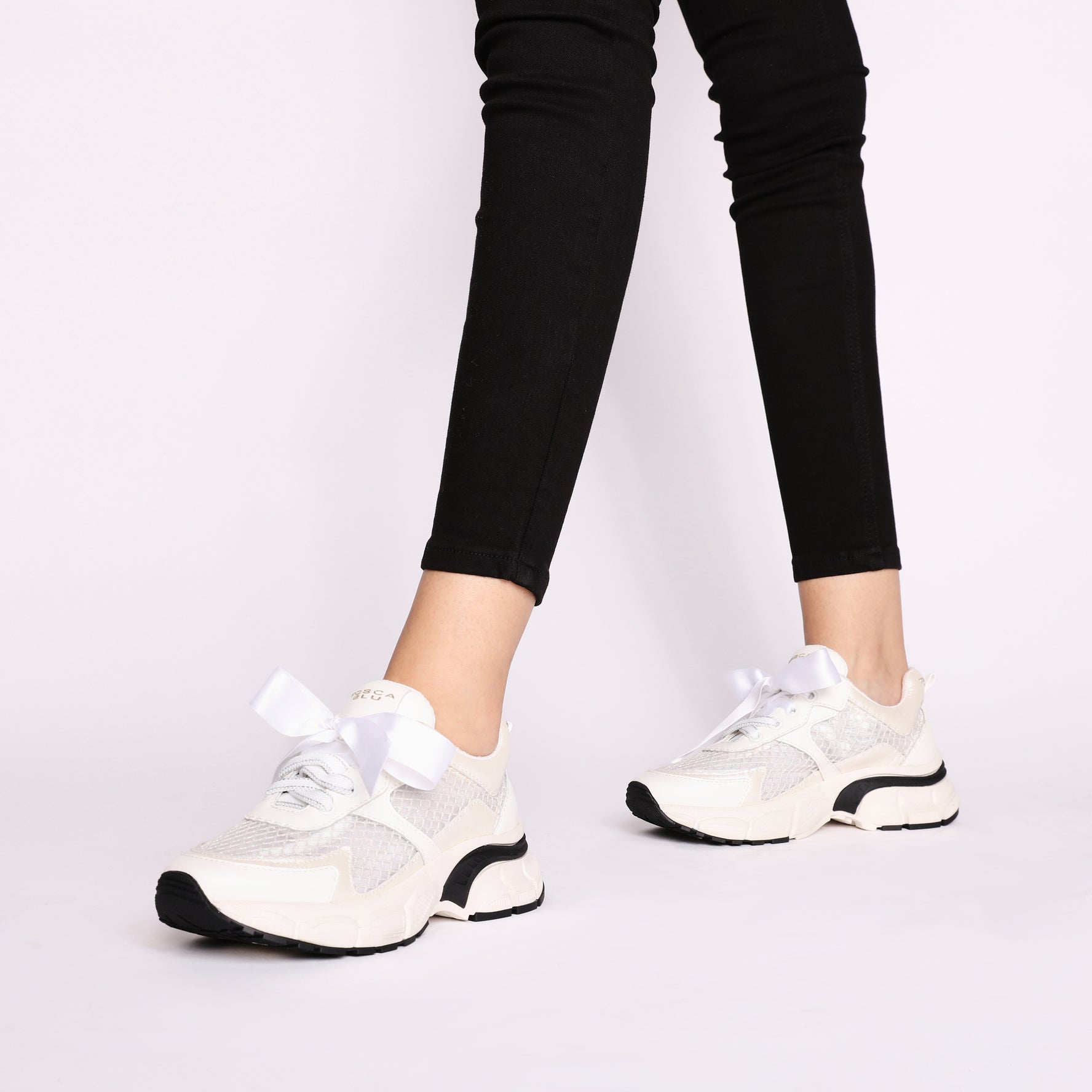 Mirabel mesh sneakers with large white bow