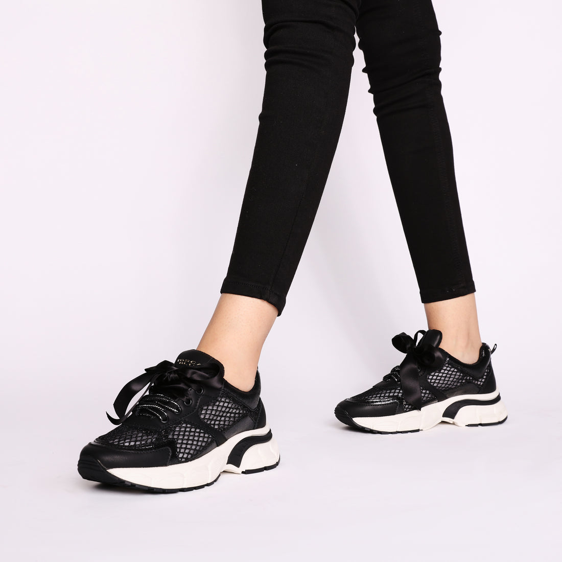 Mirabel mesh sneakers with large black bow