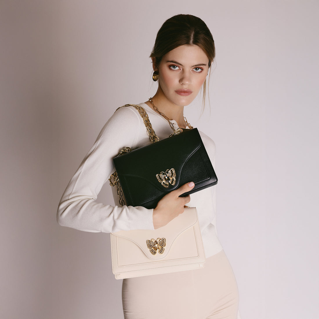 Tracollina Sweet Bag con accessorio farfalla colore nero