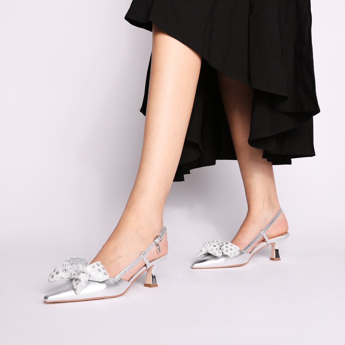 Doha patent leather slingback with silver bow