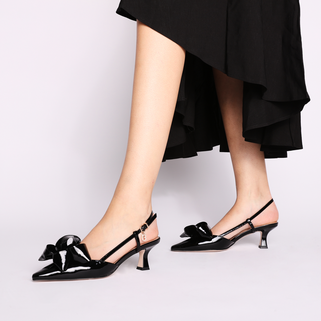 Doha patent leather slingback with black bow