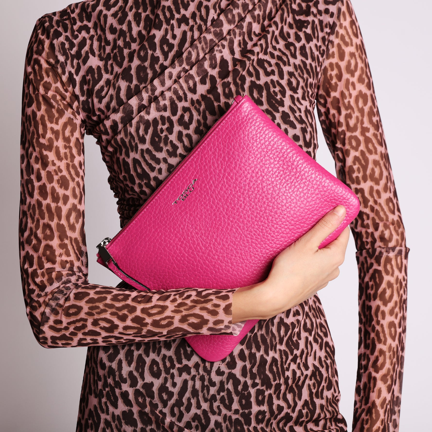 Tris clutch bag in fuchsia Citylife leather