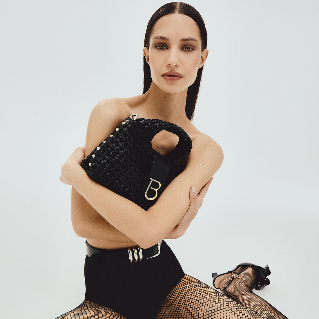 Mini handbag in black Sahara woven leather