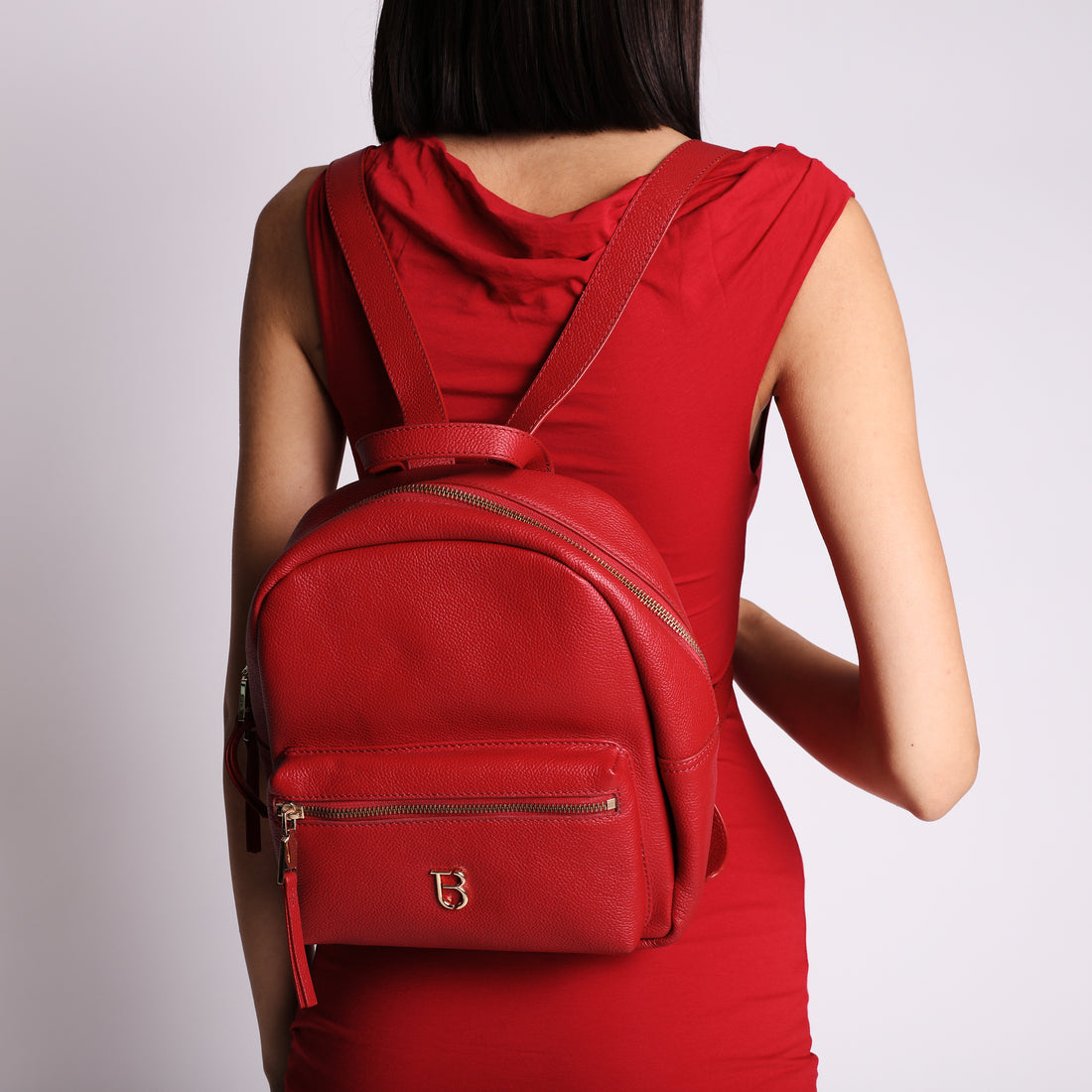 Roma leather backpack with red pocket