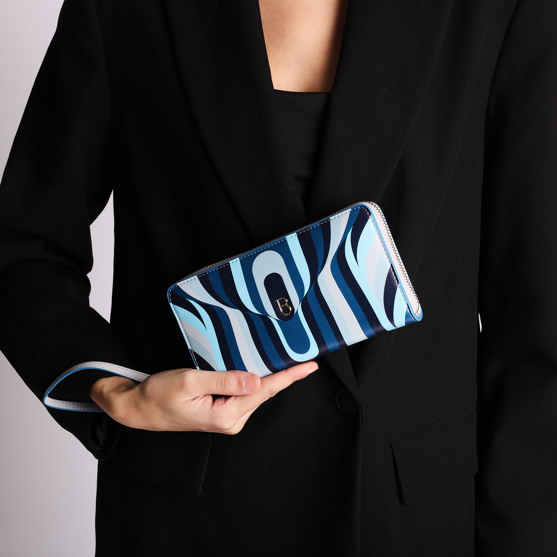 Portafoglio zip around Grace in pelle con stampa colore bluette