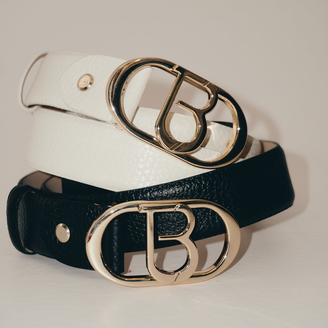 Leather belt with black logo buckle