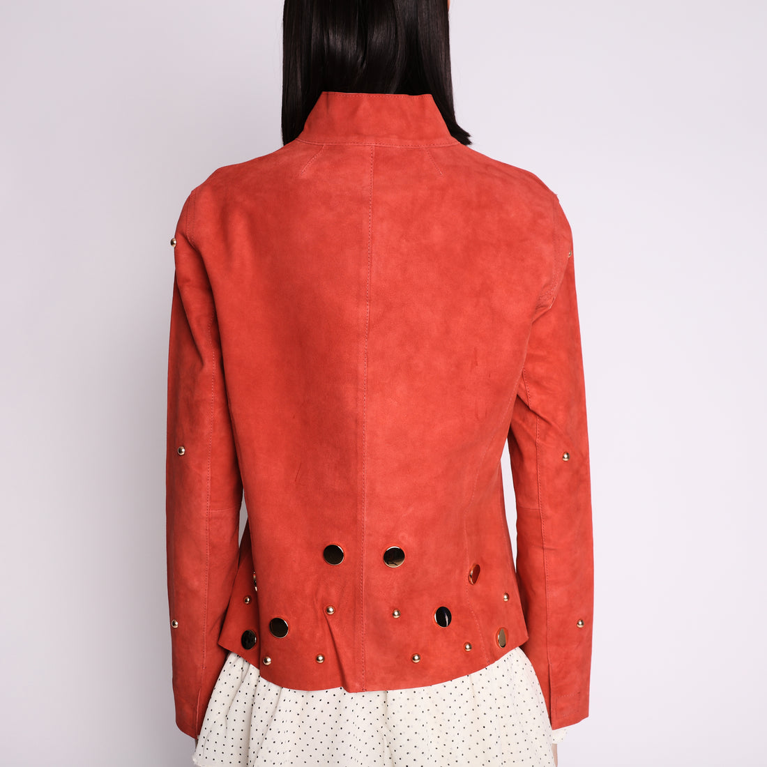 Giacca in suede con borchie colore corallo